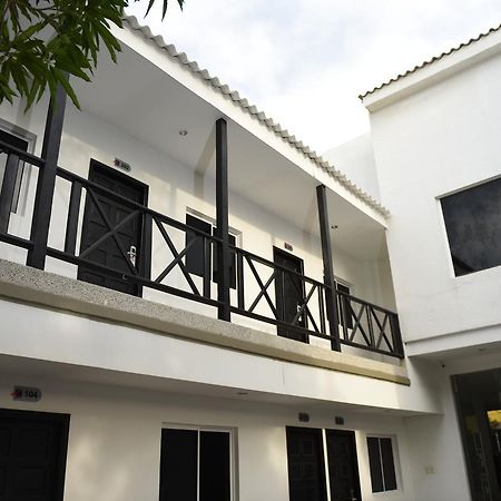 Hotel El Emigrante ปูแอร์โตโคลอมเบีย ภายนอก รูปภาพ
