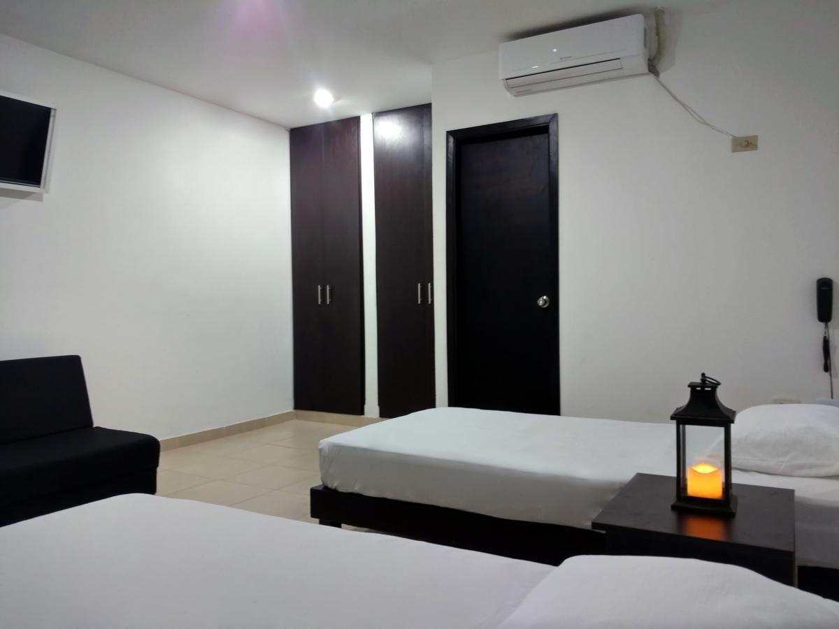 Hotel El Emigrante ปูแอร์โตโคลอมเบีย ภายนอก รูปภาพ