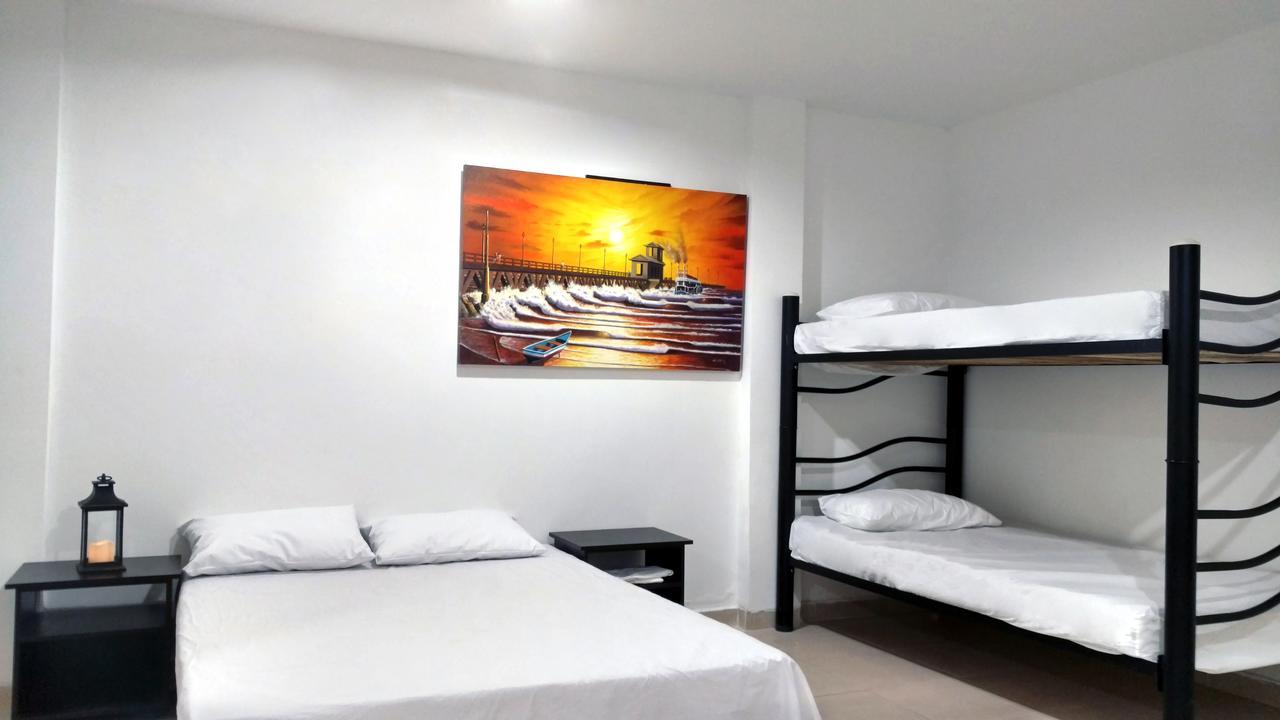 Hotel El Emigrante ปูแอร์โตโคลอมเบีย ภายนอก รูปภาพ