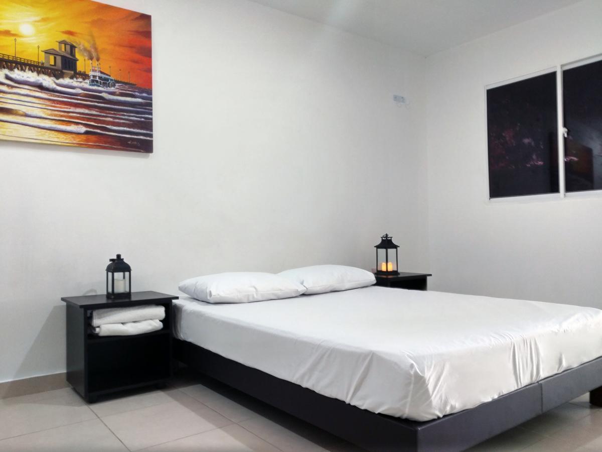 Hotel El Emigrante ปูแอร์โตโคลอมเบีย ภายนอก รูปภาพ