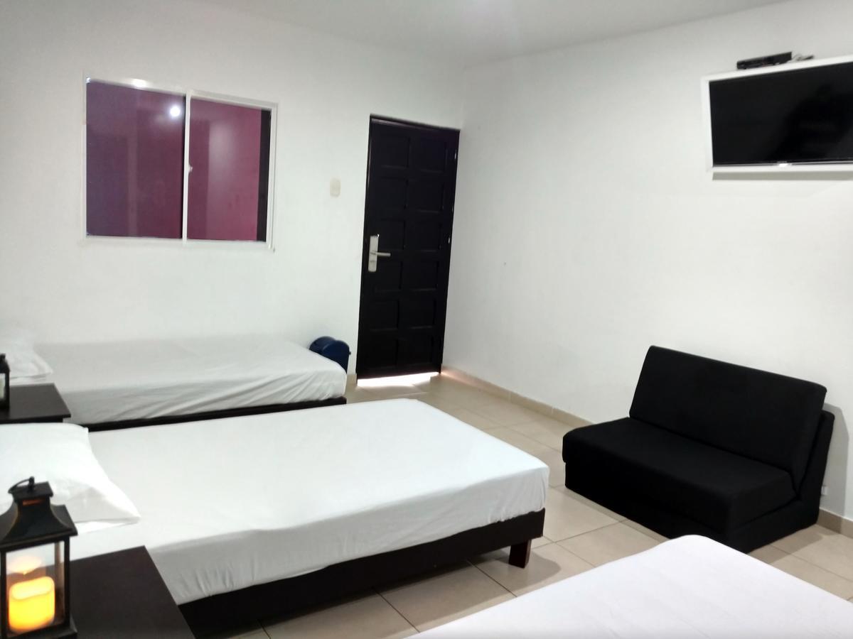 Hotel El Emigrante ปูแอร์โตโคลอมเบีย ภายนอก รูปภาพ