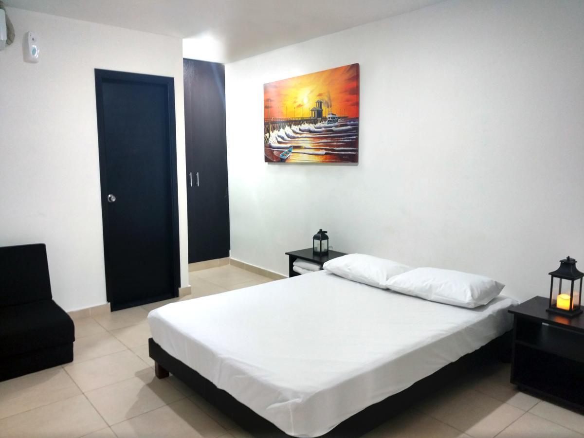 Hotel El Emigrante ปูแอร์โตโคลอมเบีย ภายนอก รูปภาพ